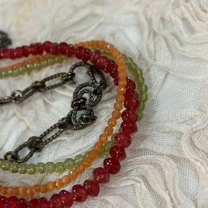 Multi Strand Fall warm colors red, green, brass & orange